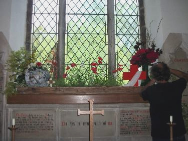 Alan adds the finishing touches to the poppy display